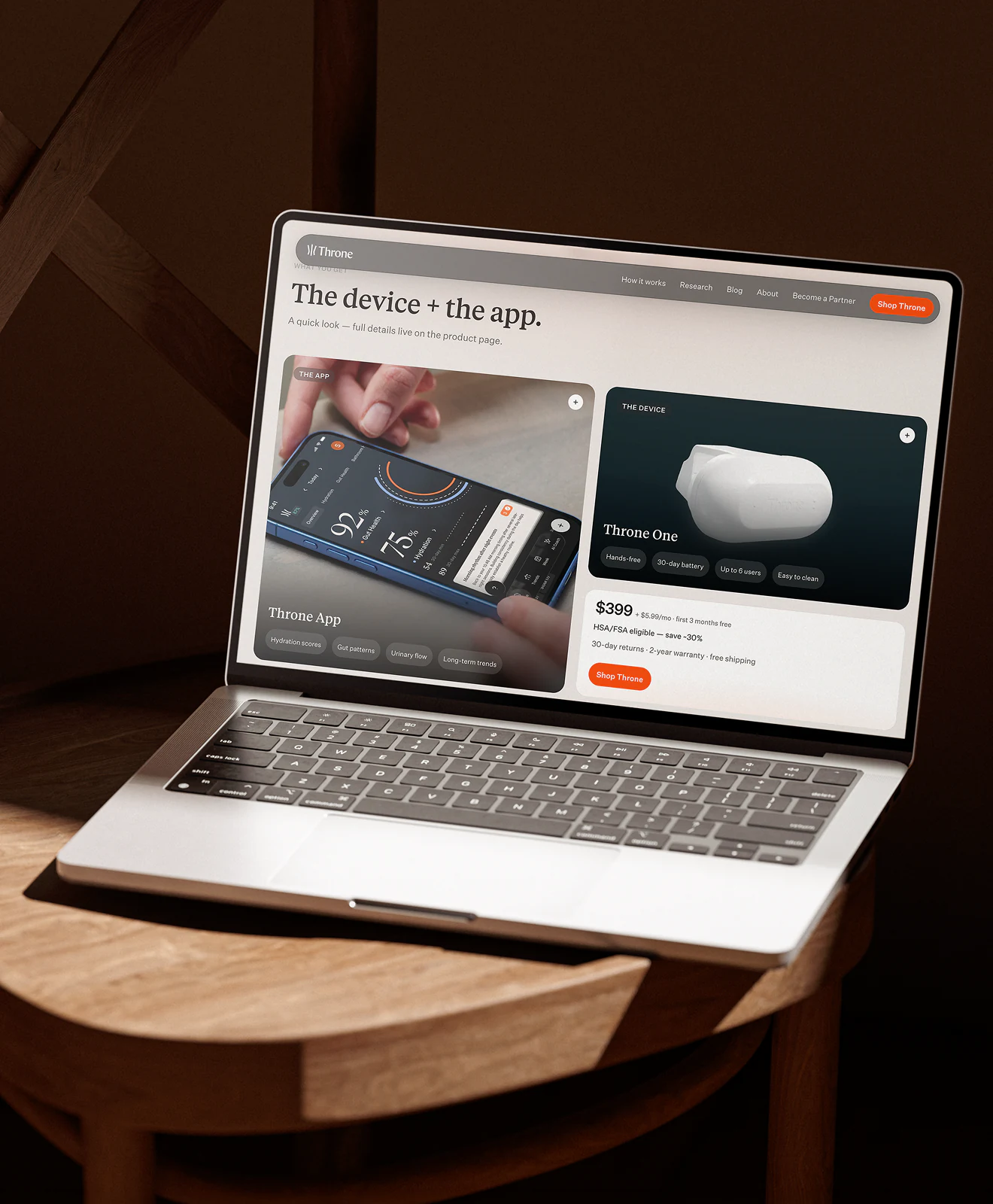 The Throne homepage on a laptop, introducing the device alongside its companion app